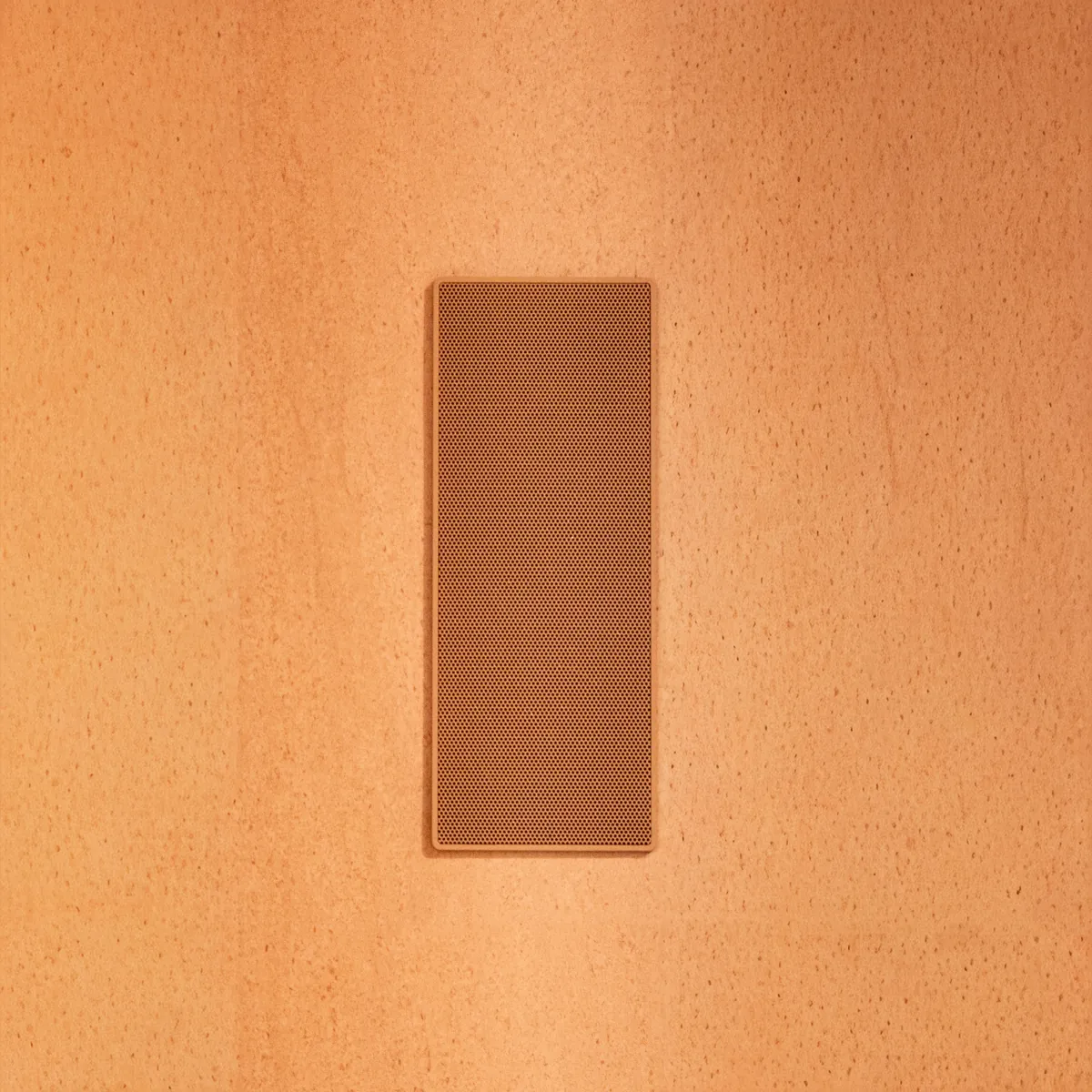 Magna Micro-Framed array grille in a textured wall installation