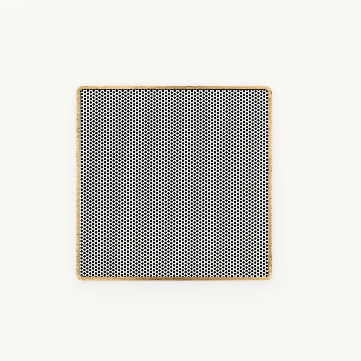Magna Micro-Framed square speaker grille in a wood-panel installation