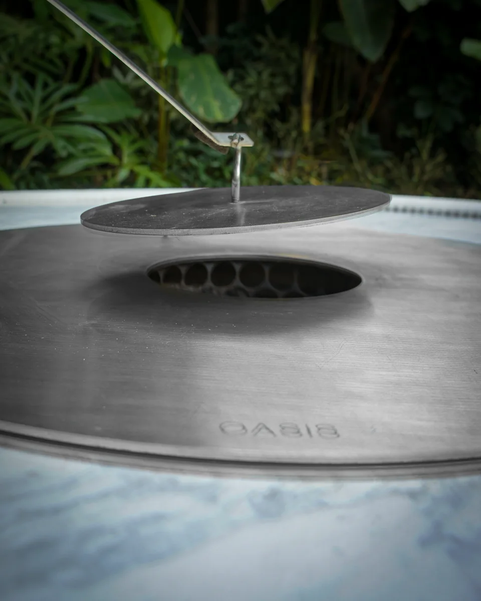 Magna Oasis natural-stone tabletop with optional central ice-bucket configuration